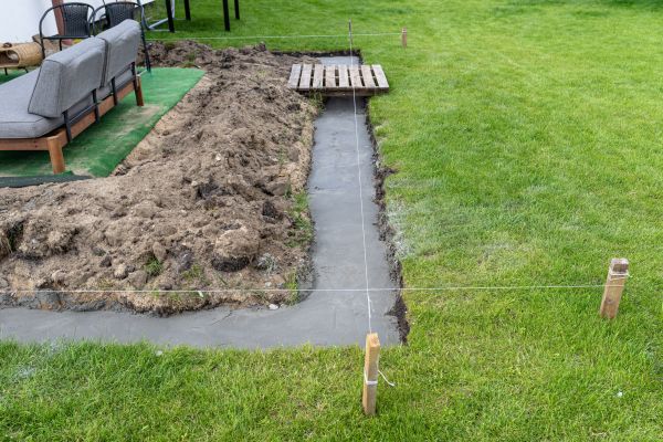 Cement Footer Installation in Dover